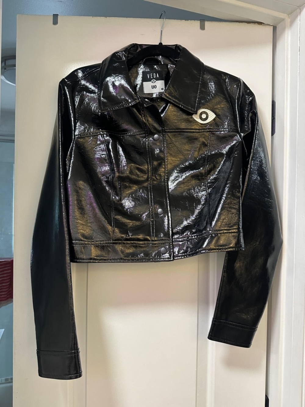 Veda Glossy Black Cropped Patent Jacket with Eye Patch